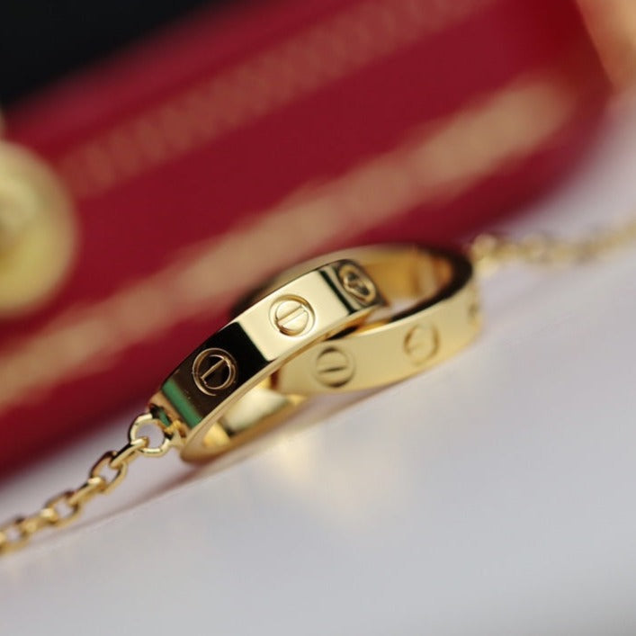 CARTIER LOVE NECKLACE DOUBLE RING GOLD