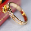 CARTIER LOVE RING 2.65MM GOLD DIAMOND