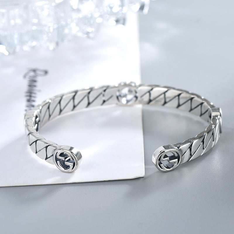 GUCCI SILVER INTERLOCKING OPEN BRACELET