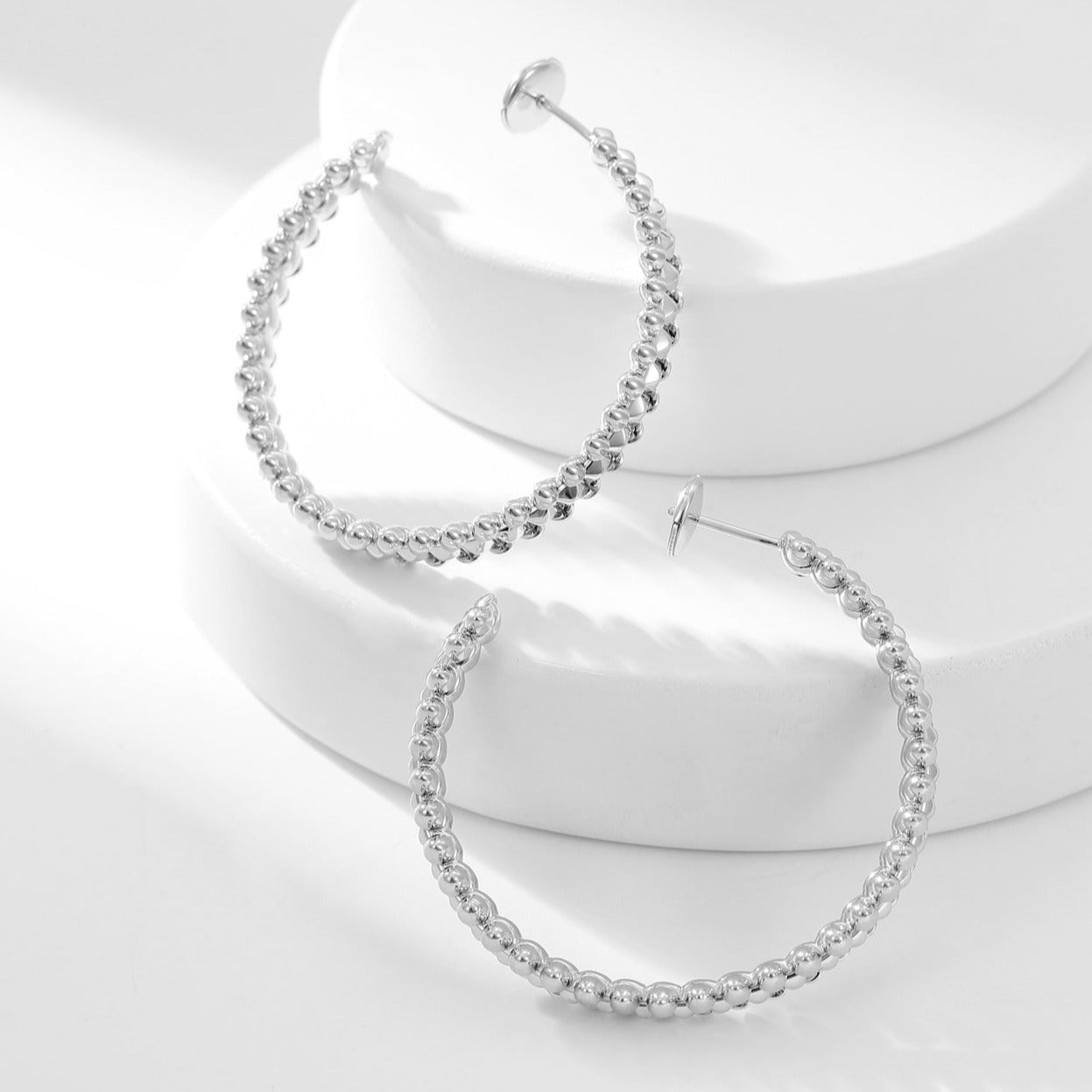 CARTIER CLASH HOOP EARRINGS