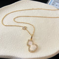 QEELIN WULU 2 MOTIF MOP PINK GOLD NECKLACE