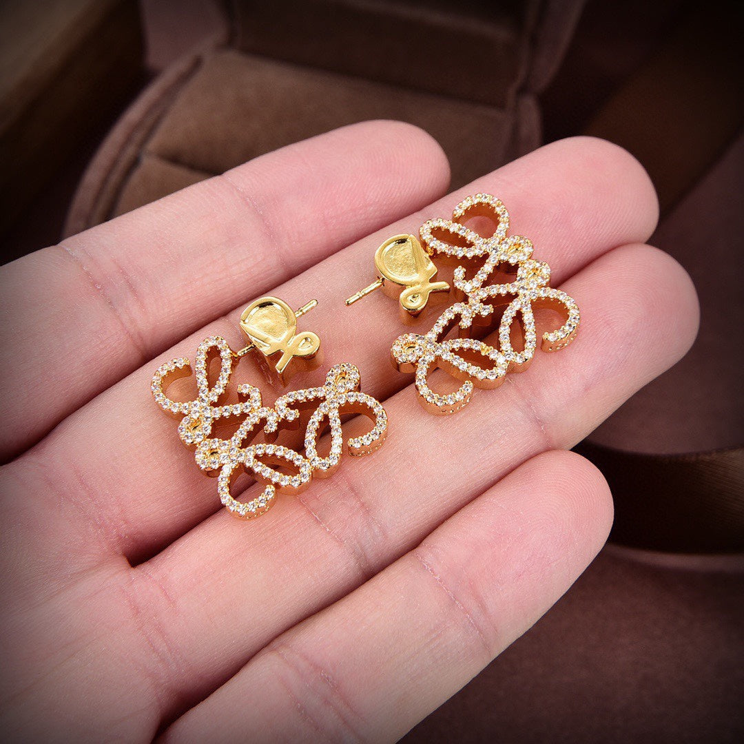 LOEWE PAVED ANAGRAM GOLD EARRINGS