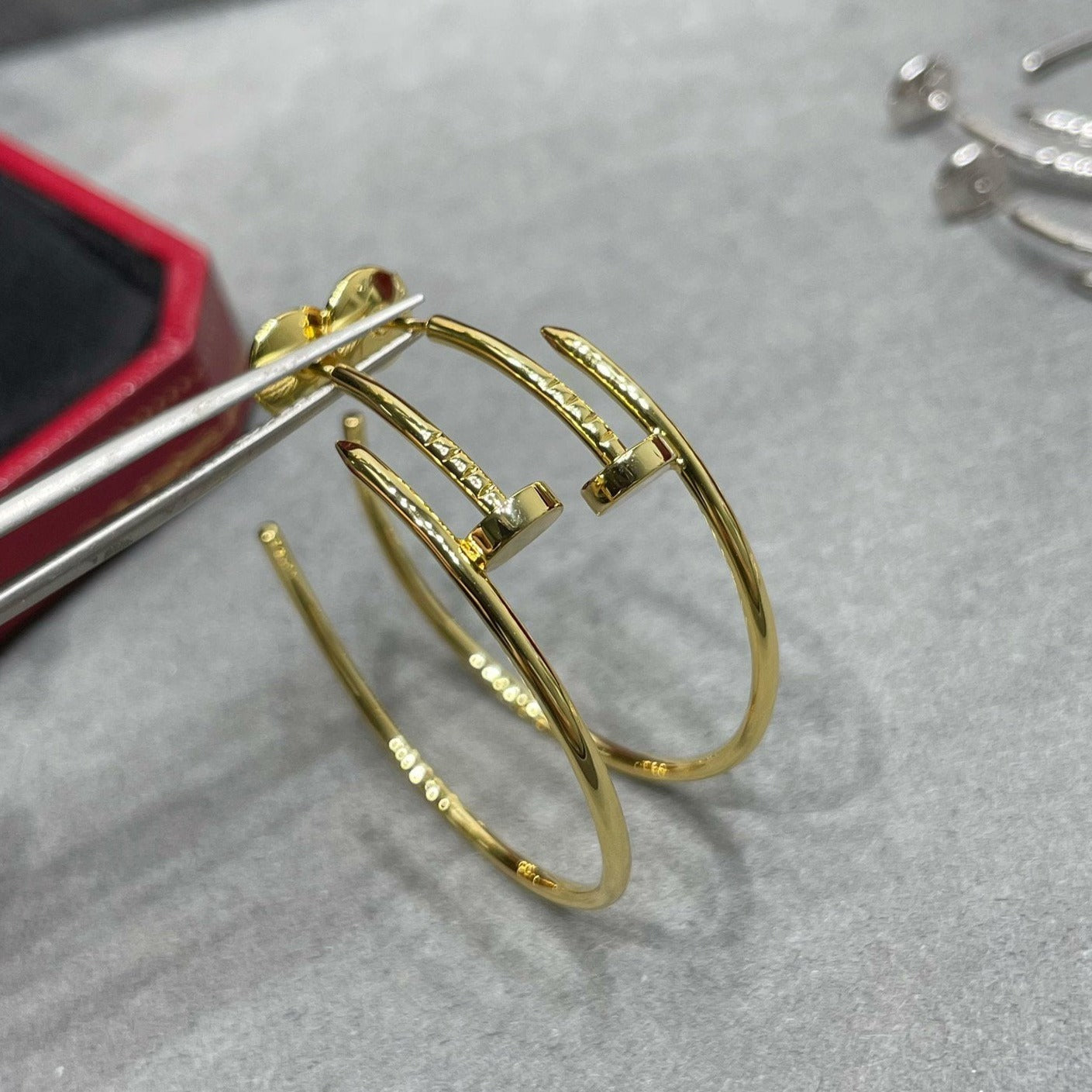 CARTIER JUSTE LARGE HOOP EARRINGS