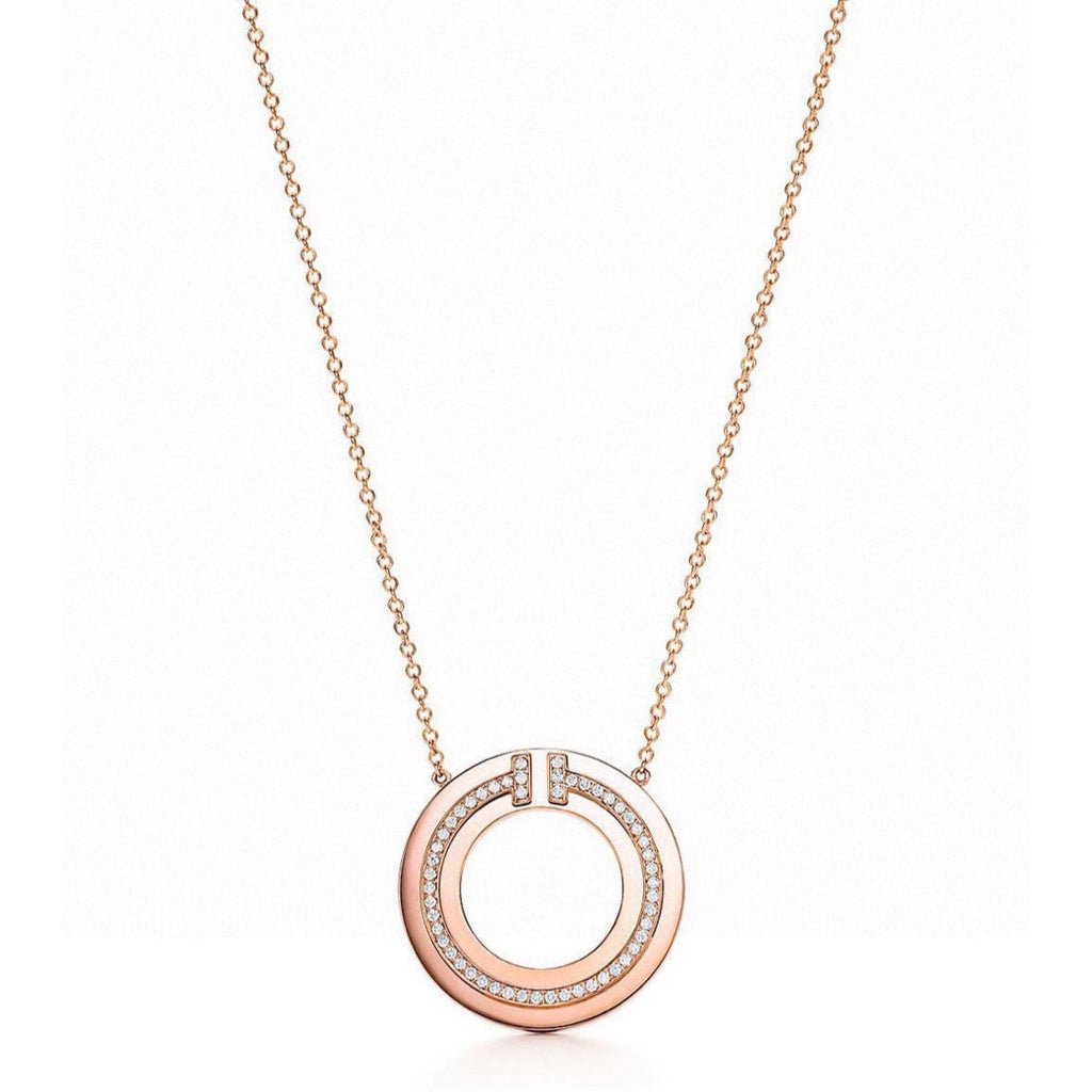 TIFFANY DIAMOND AND MOTHER OF PEARL CIRCLE PENDANT