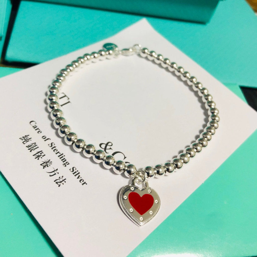 TIFFANY LOVE RED HEART TAG BEAD BRACELET