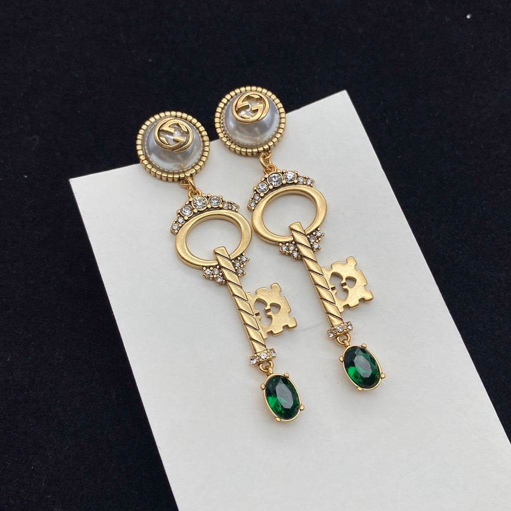 GUCCI KEY SHAPED DANGLE  EARRING