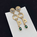 GUCCI KEY SHAPED DANGLE  EARRING