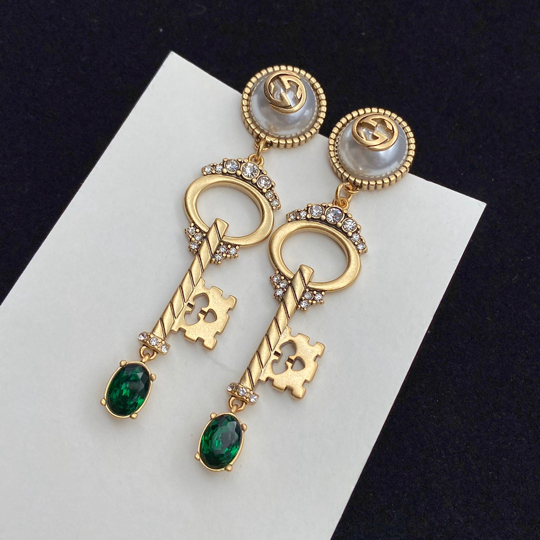 GUCCI KEY SHAPED DANGLE  EARRING