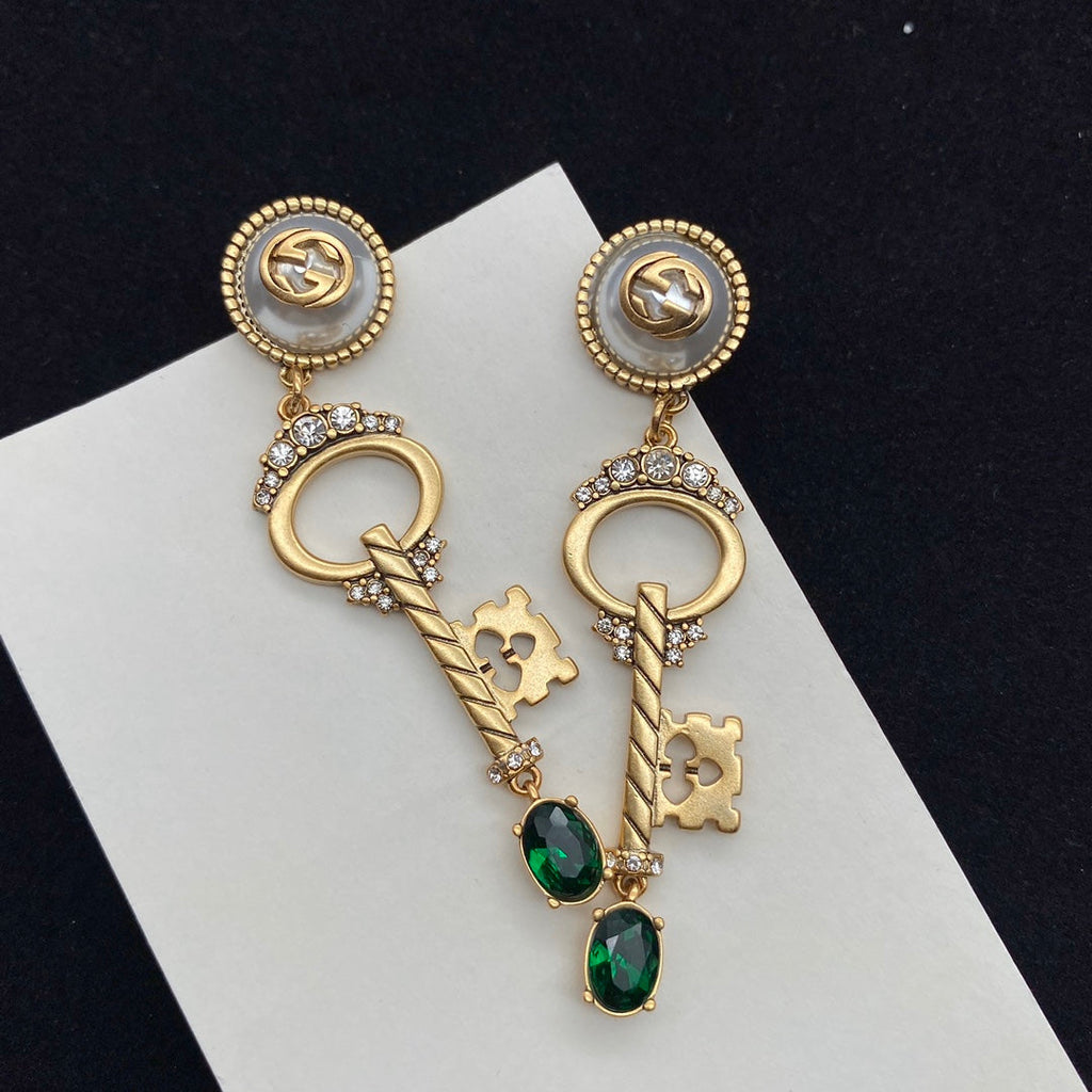 GUCCI KEY SHAPED DANGLE  EARRING