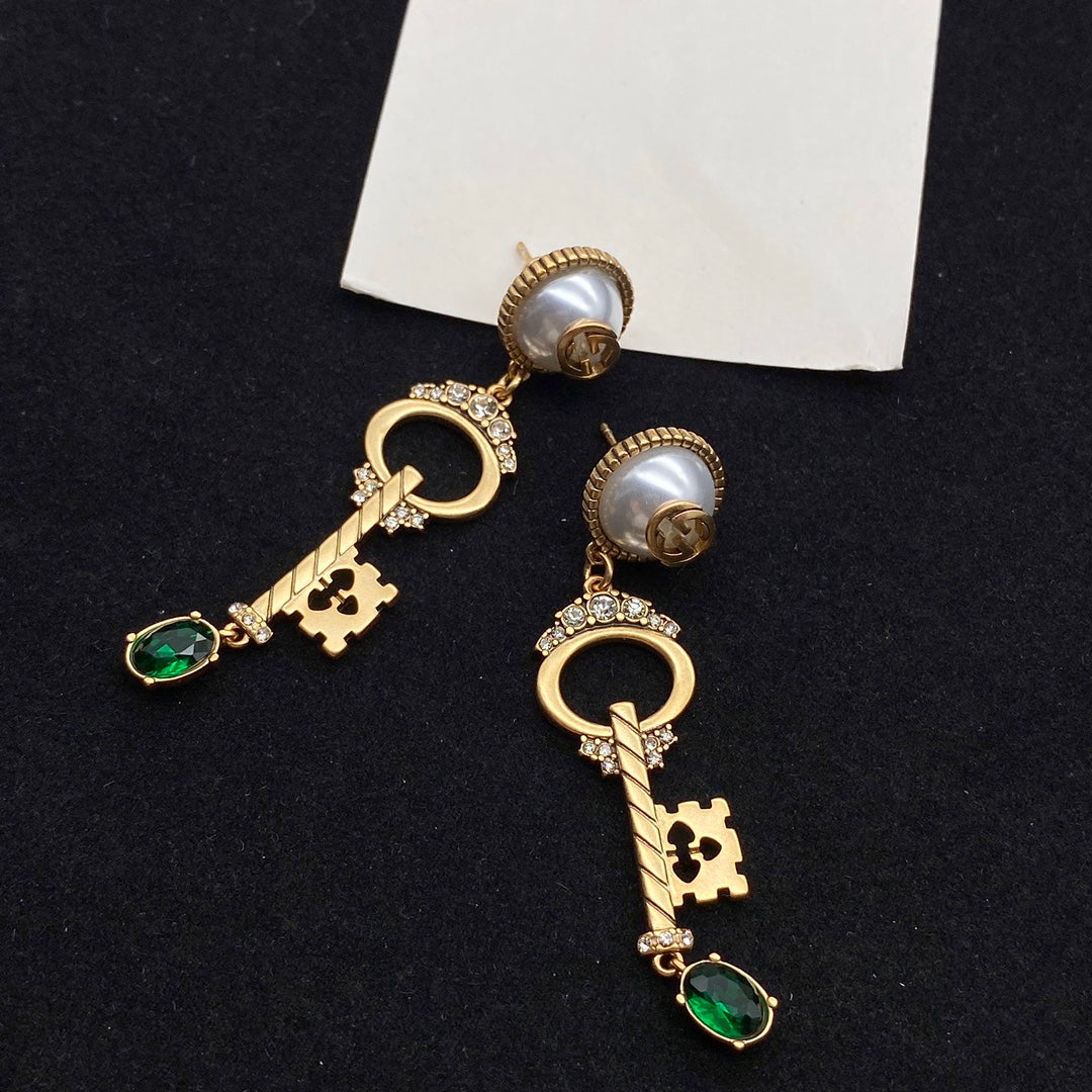 GUCCI KEY SHAPED DANGLE  EARRING