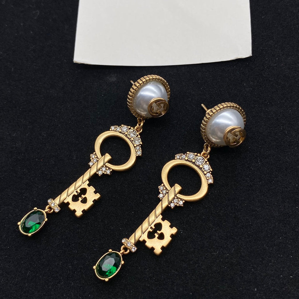 GUCCI KEY SHAPED DANGLE  EARRING