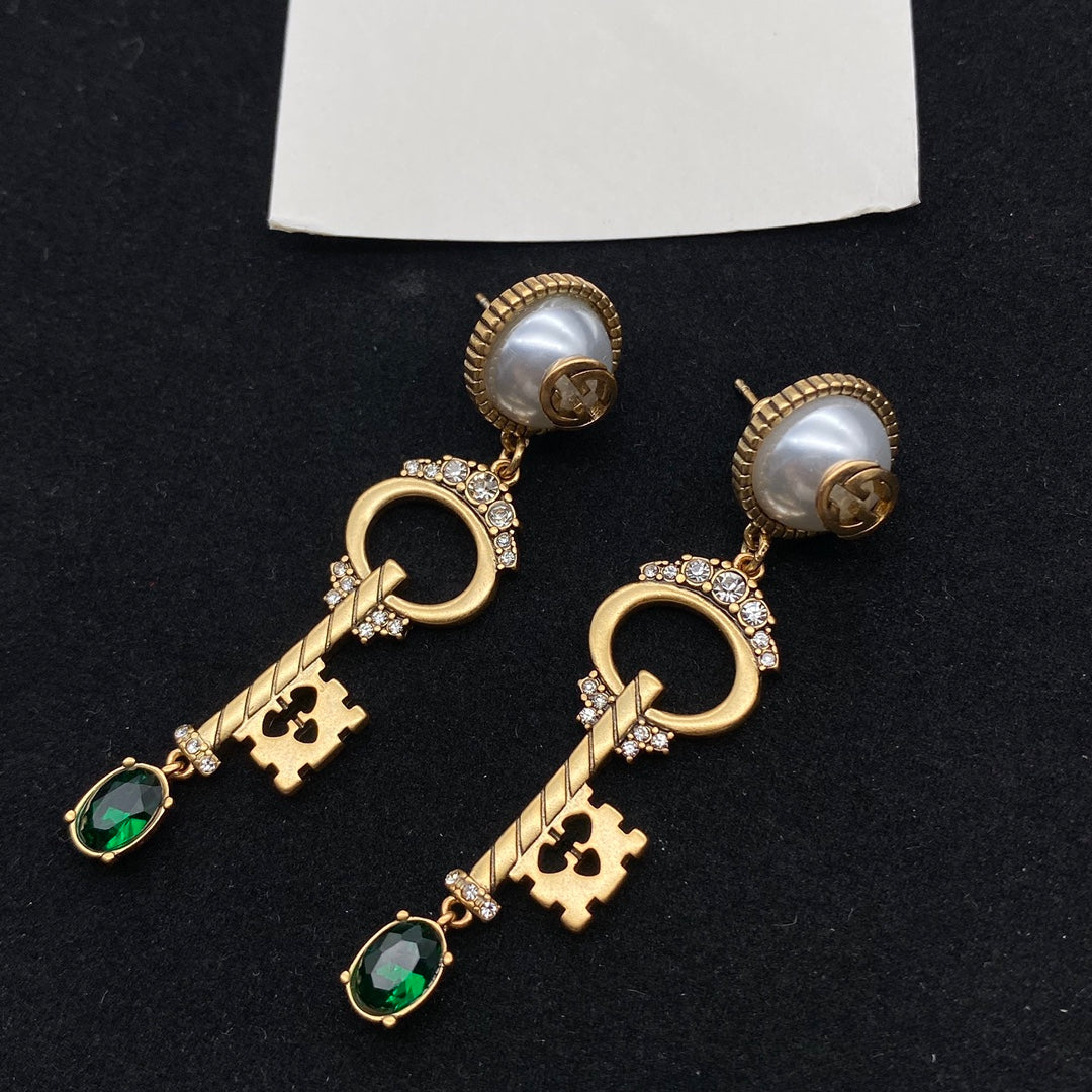 GUCCI KEY SHAPED DANGLE  EARRING