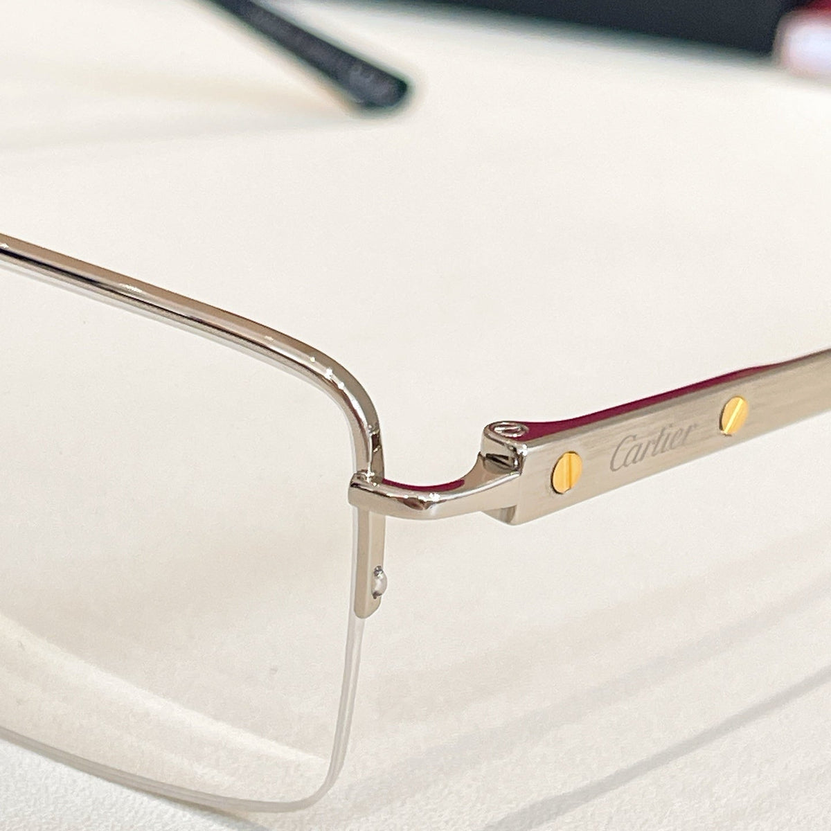 CARTIER SANTOSSEMI RIMLESS RECTANGULAR FRAME SUNGLASSES CT0554O IN METAL