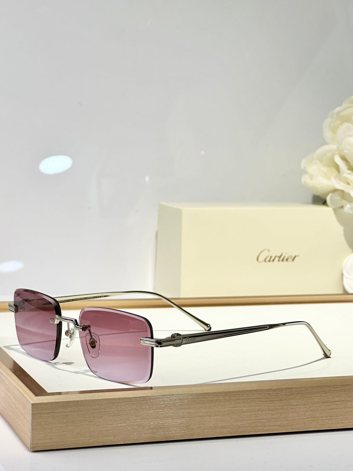 CARTIER RIMLESS SQUARE FRAME SUNGLASSES CT0610S IN METAL